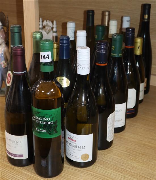 Eighteen assorted bottles of white wine including Chablis, Sauteries, Saint Veran and two half bottles of white wine